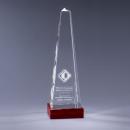 Clear Optical Crystal Obelisk Award on a Red Base